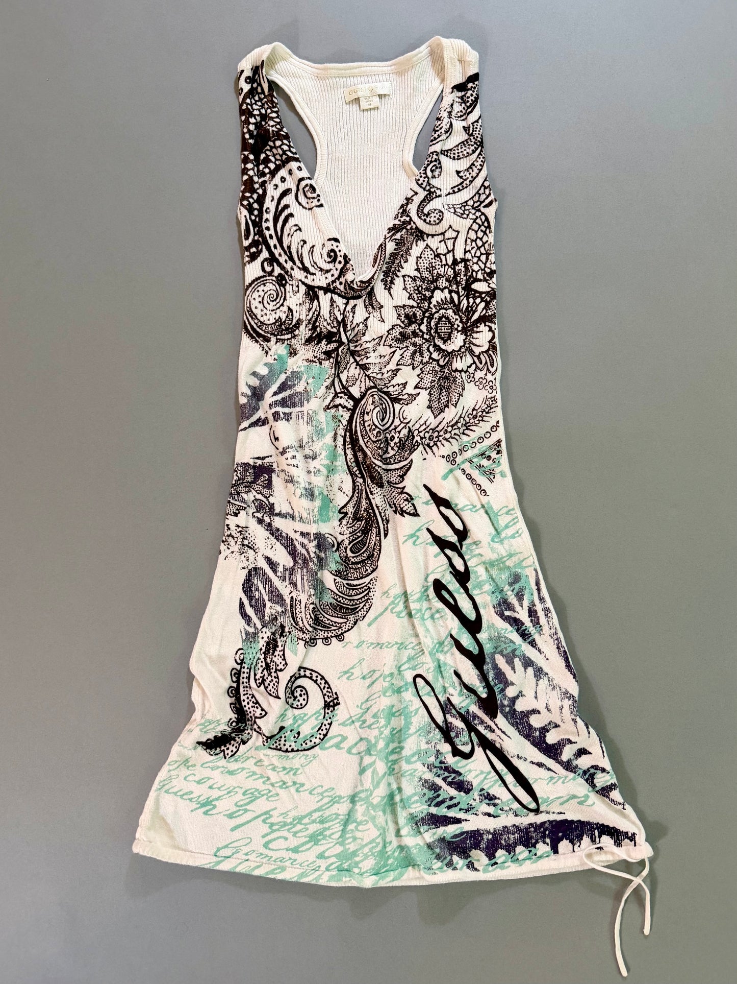 Full front view of the late-2000s Guess Jeans graphic dress in cream white with aqua and brown print.