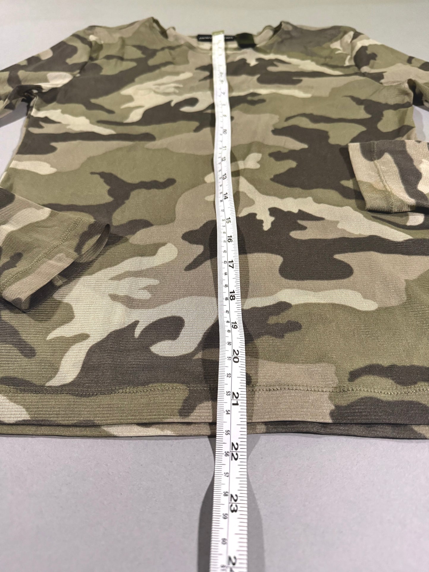 Vintage mesh camo printed long sleeve DKNY shirt with measuring tape showing 21 inches length