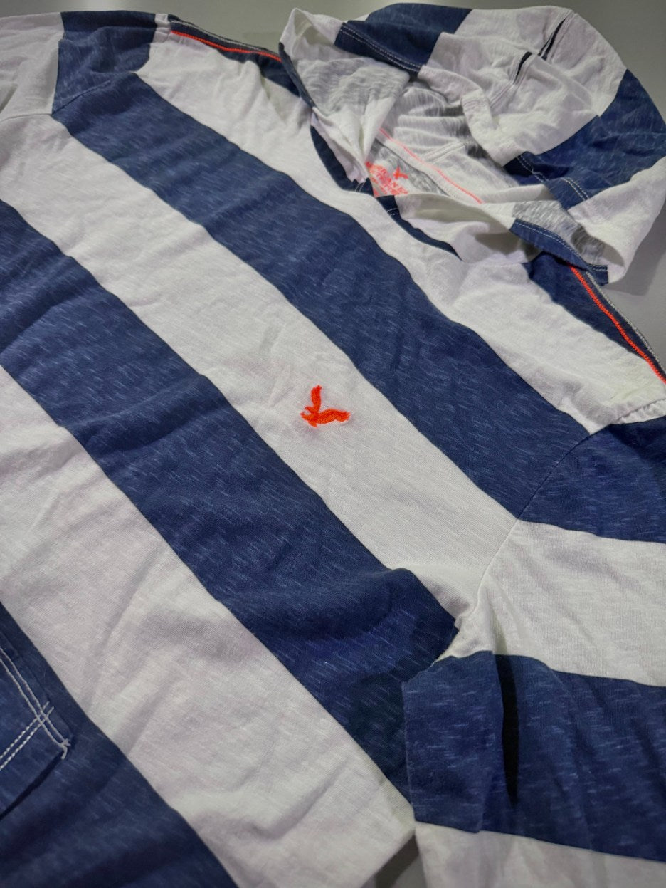 Angled view of American eagle hooded shirt from 2014, showing neon orange embroidered logo and contrast stitching. 