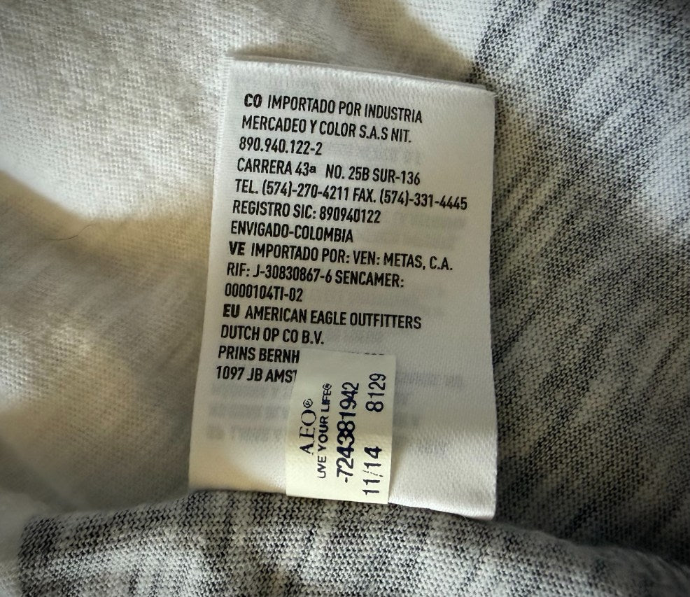 Back of American Eagle care tag showing manufacture date of November 2014. 