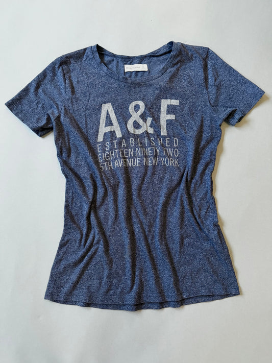Navy blue Abercrombie & Fitch t-shirt with 'A&F' logo on a light gray background