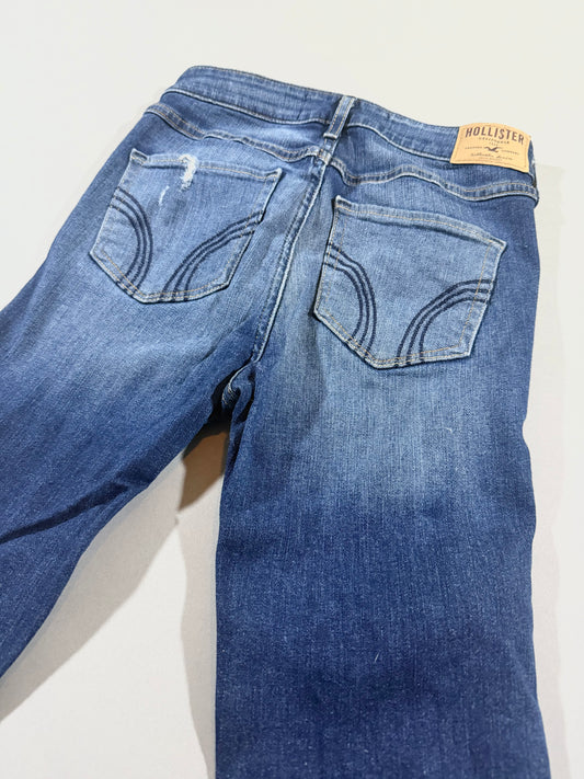 Close-up of the back pockets and Hollister leather logo patch on 2010 high-rise flare jeans.