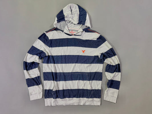 Photo of a long sleeve hooded shirt from American Eagle with thick navy and white stripes and orange eagle embroidery. 