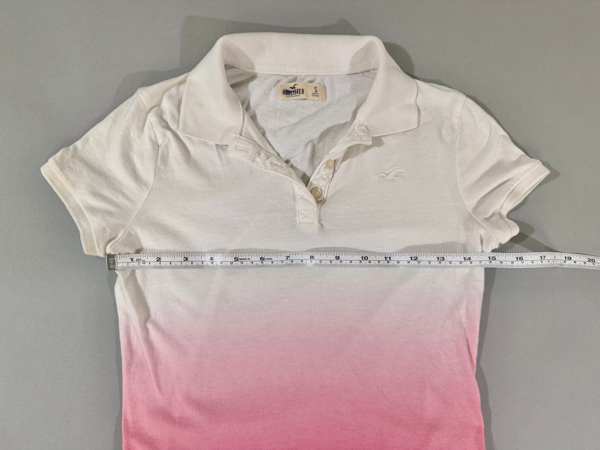 Chest measurement of Hollister white and pink gradient polo shirt