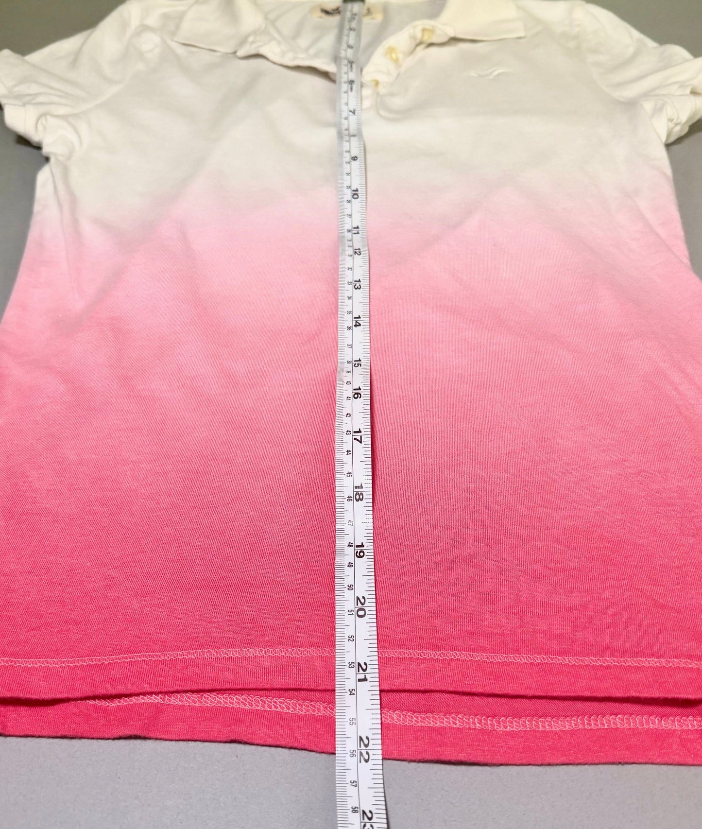 Length measurement of Hollister women’s ombré polo shirt.