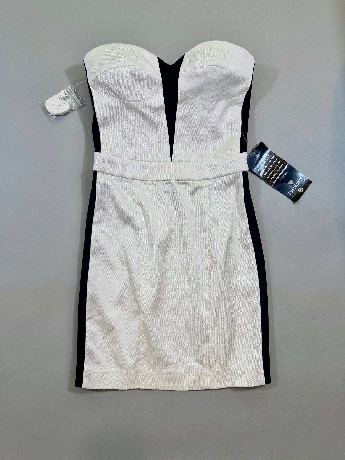 Black and white Bebe club mini dress with tags still attached