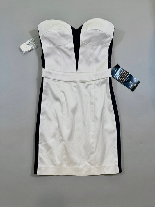 Black and white Bebe club mini dress with tags still attached