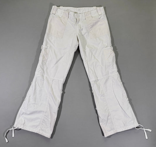 Vintage Y2K Abercrombie & Fitch white wide-leg cargo pants with utility pockets, button-tab details, and adjustable drawstring hems, front view.