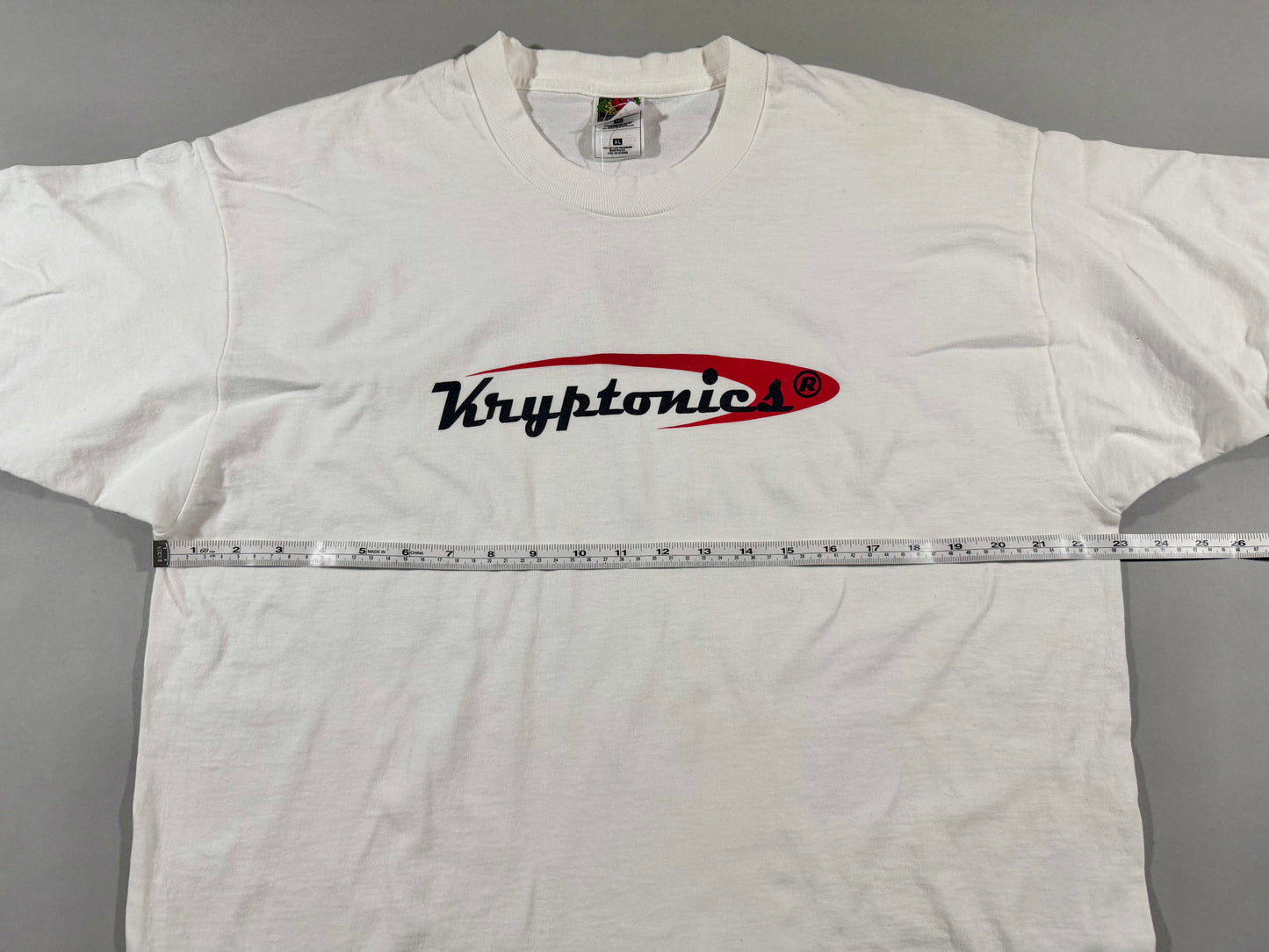 Vintage Kryptonics white T-shirt with pit-to-pit measurement shown across chest.
