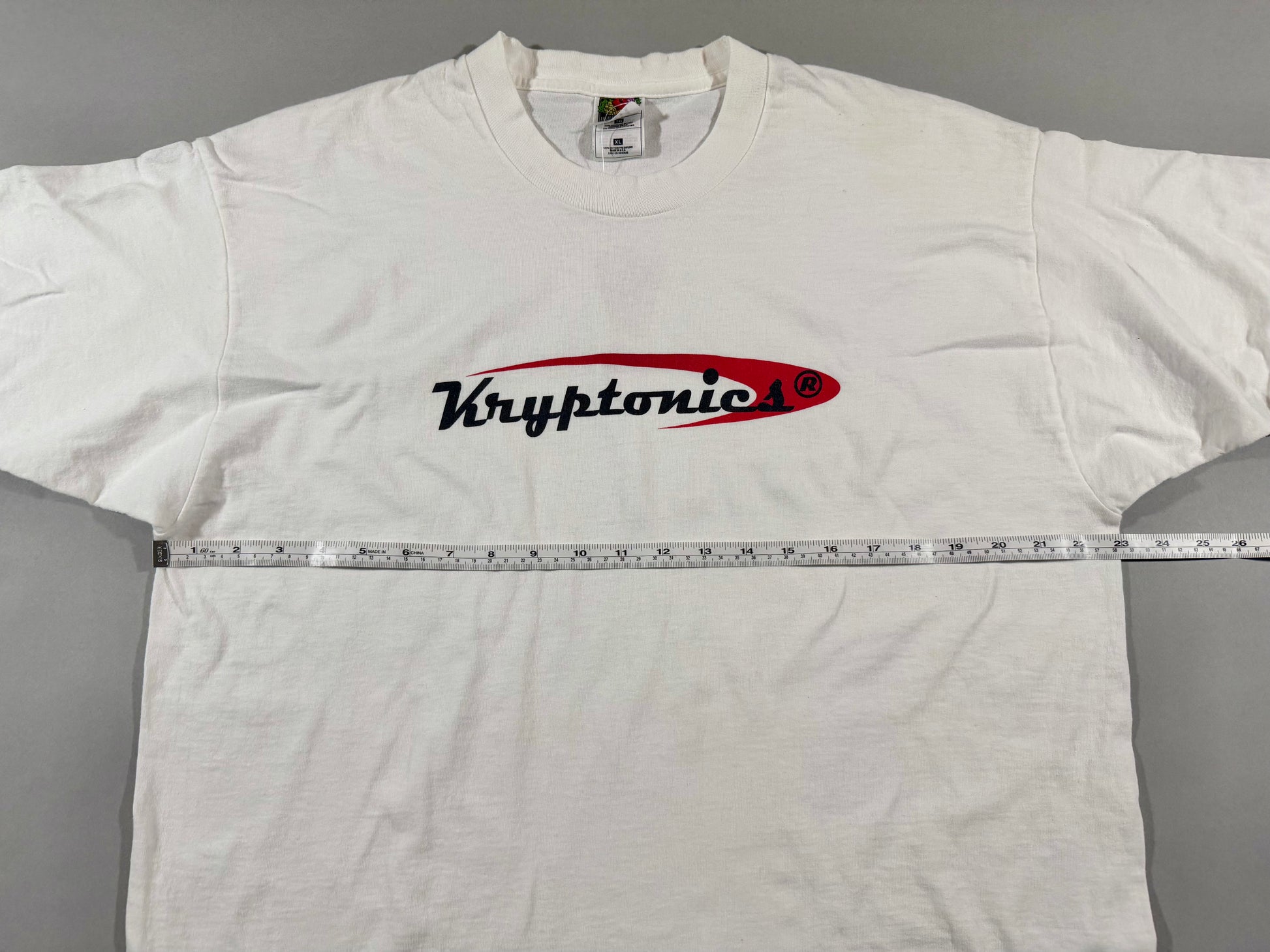 Vintage Kryptonics white T-shirt with pit-to-pit measurement shown across chest.
