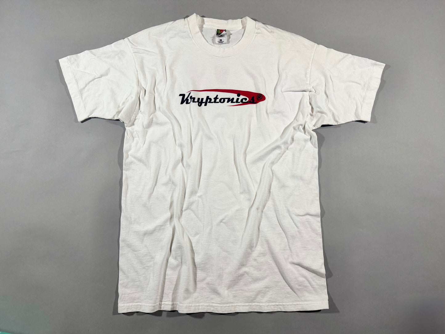 Vintage Kryptonics white logo T-shirt front view featuring red and black skateboard brand graphic.
