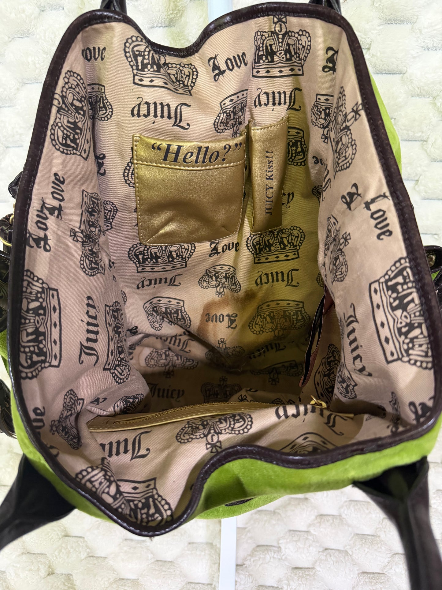 Vintage Juicy Couture tote interior with crown and Juicy print lining, gold Hello? phone pocket and Juicy Kiss! lipstick holder.