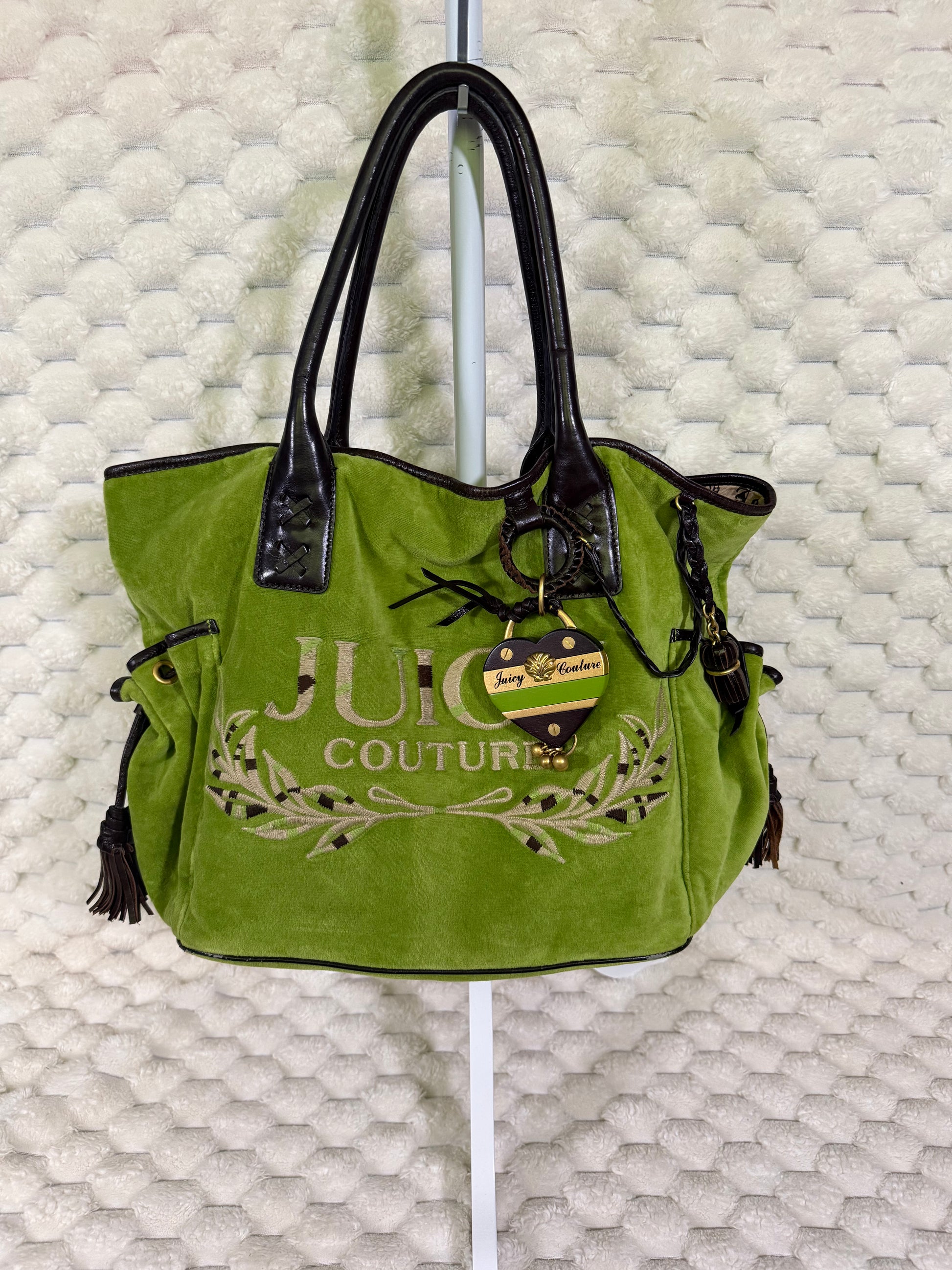 Vintage Juicy Couture Splendor tote in green velour with brown trim, embroidered logo, tassels and heart charm.