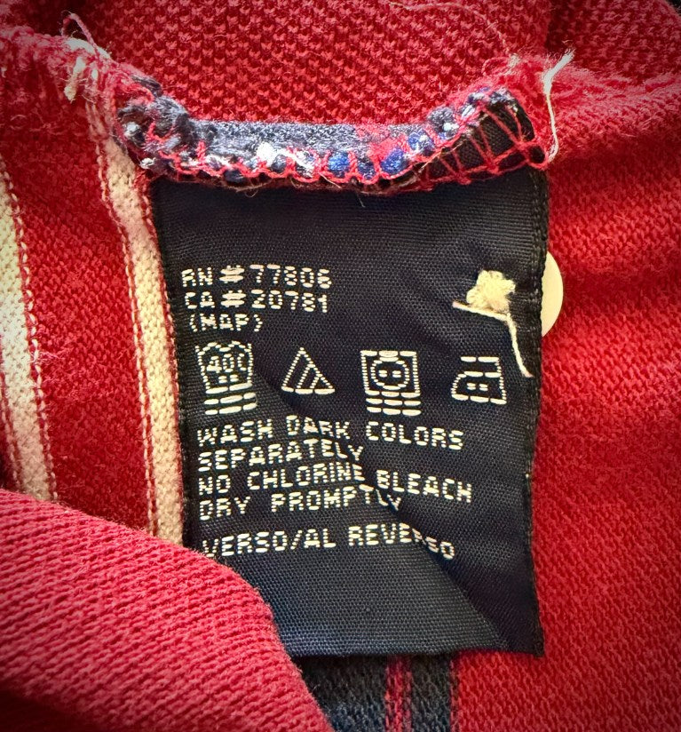 Photo of inner care tag on Y2K era Tommy Hilfiger garment. 