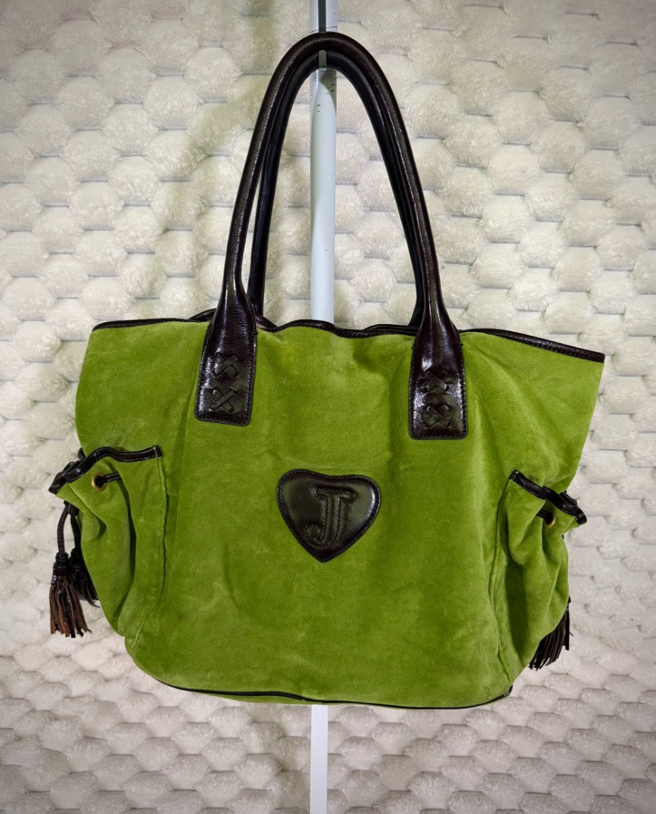 Back of vintage Juicy Couture green velour Splendor tote with brown leather-look trim, side pockets and heart logo patch.