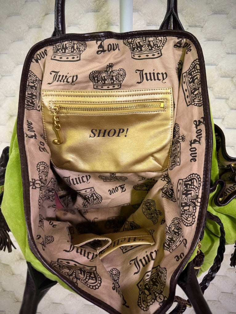 Interior of vintage Juicy Couture velour tote with crown-print lining and metallic gold SHOP zip pocket with J zipper pull.