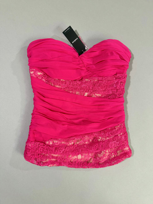 Full front view of the new with tags bebe hot pink strapless bustier top with removable straps included.