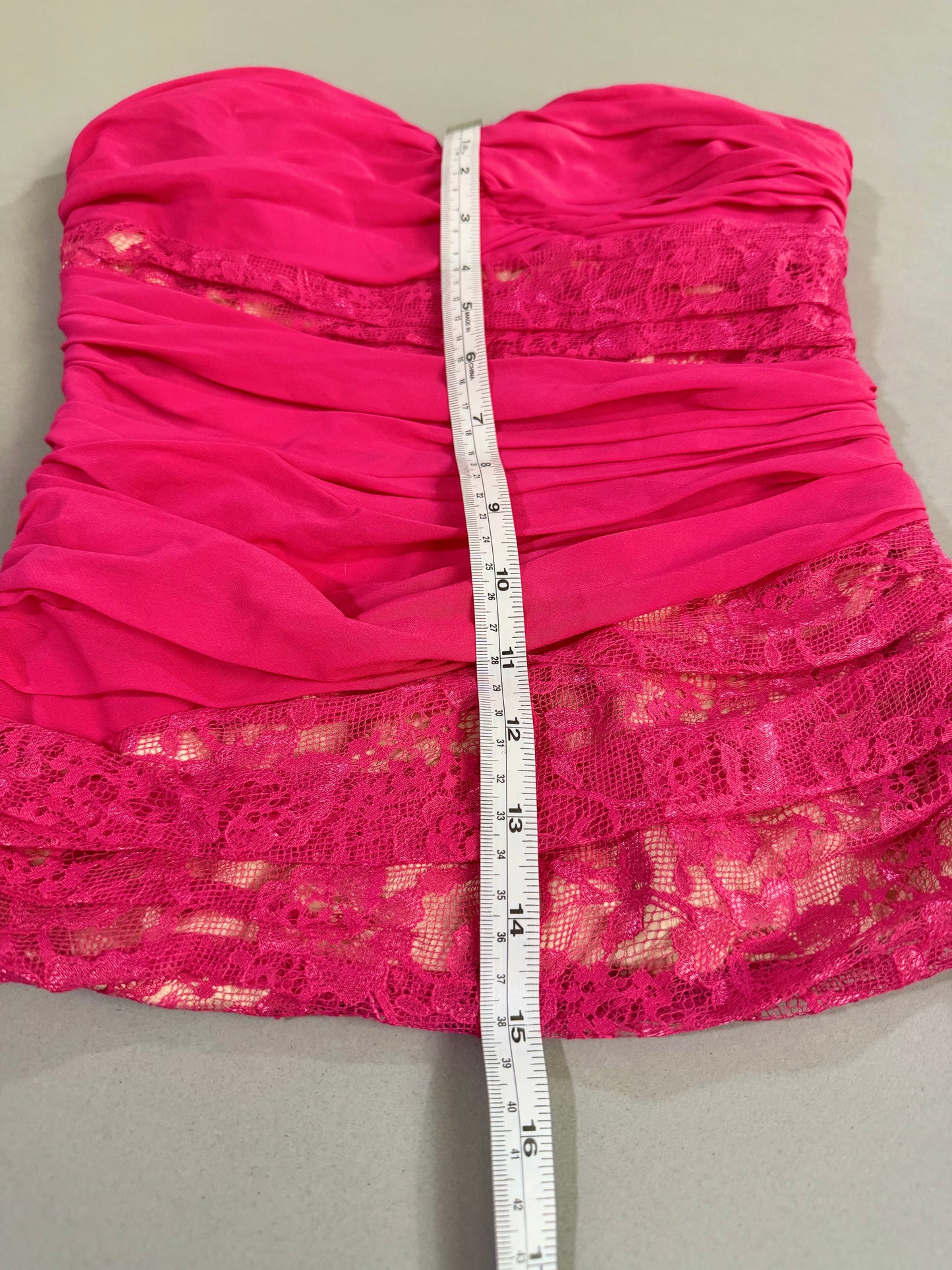 Overall length measurement from neckline to hem.