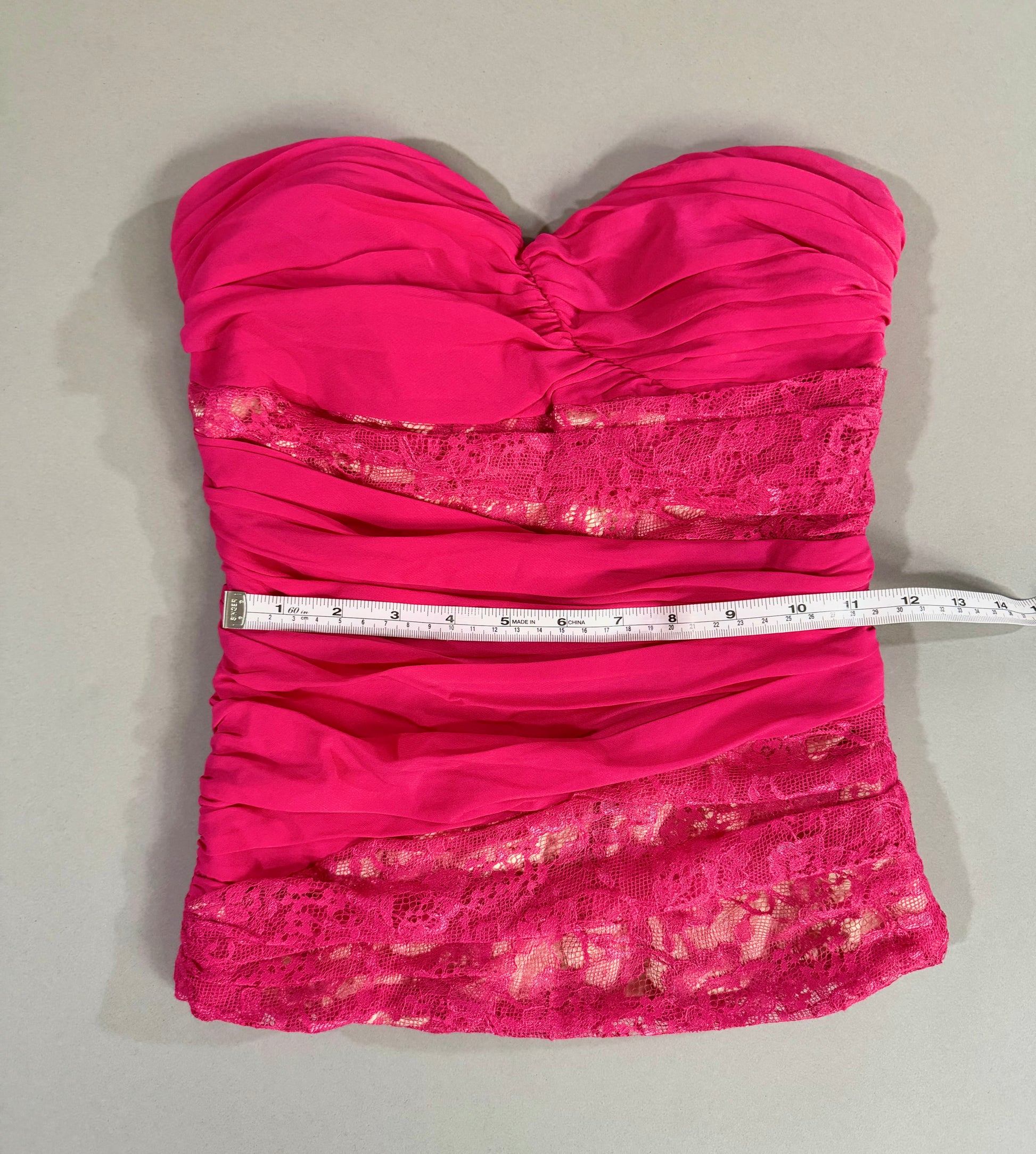 Waist measurement shown flat across the front.