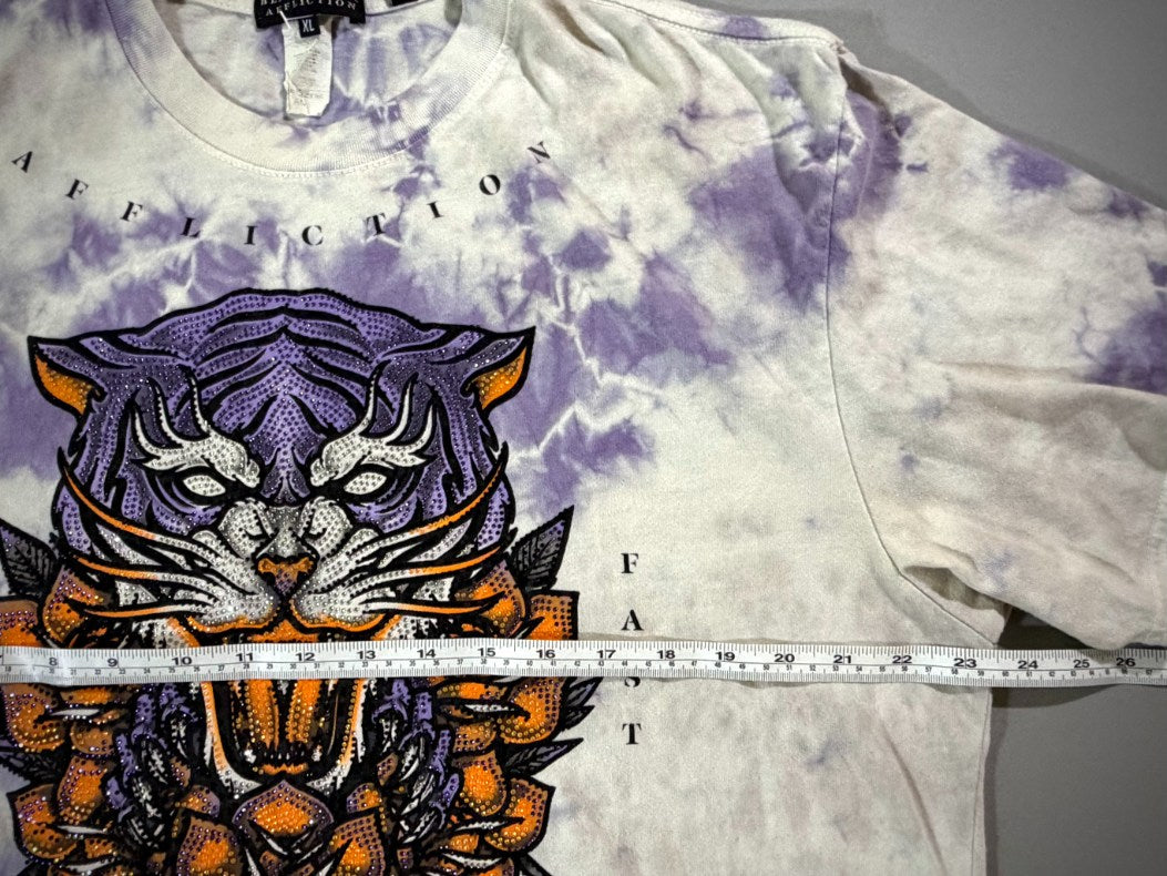 Affliction Black Label XL T-shirt shown with measuring tape across the chest.