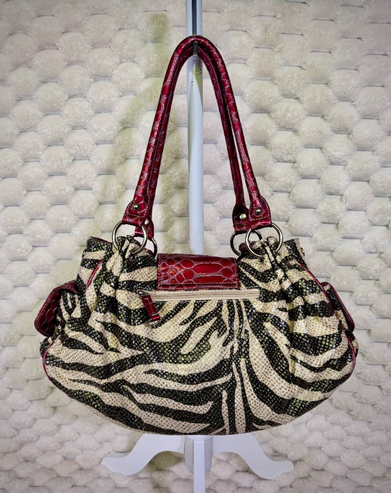 Back of Y2K zebra print shoulder bag with exterior zip pocket