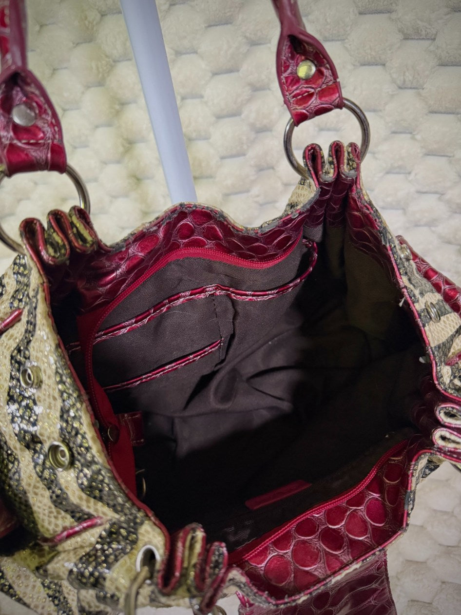 Spacious lined interior with zip pocket and slip pockets