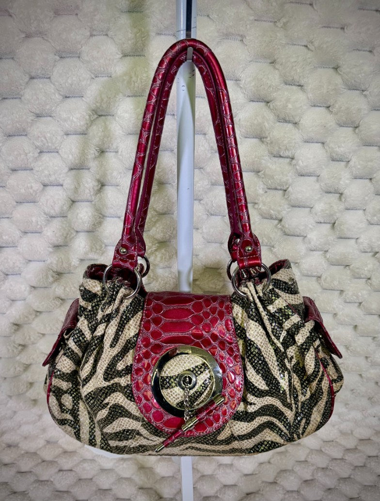 Y2K zebra print hobo shoulder bag with berry red crocodile embossed trim and oversized silver tone hardware.