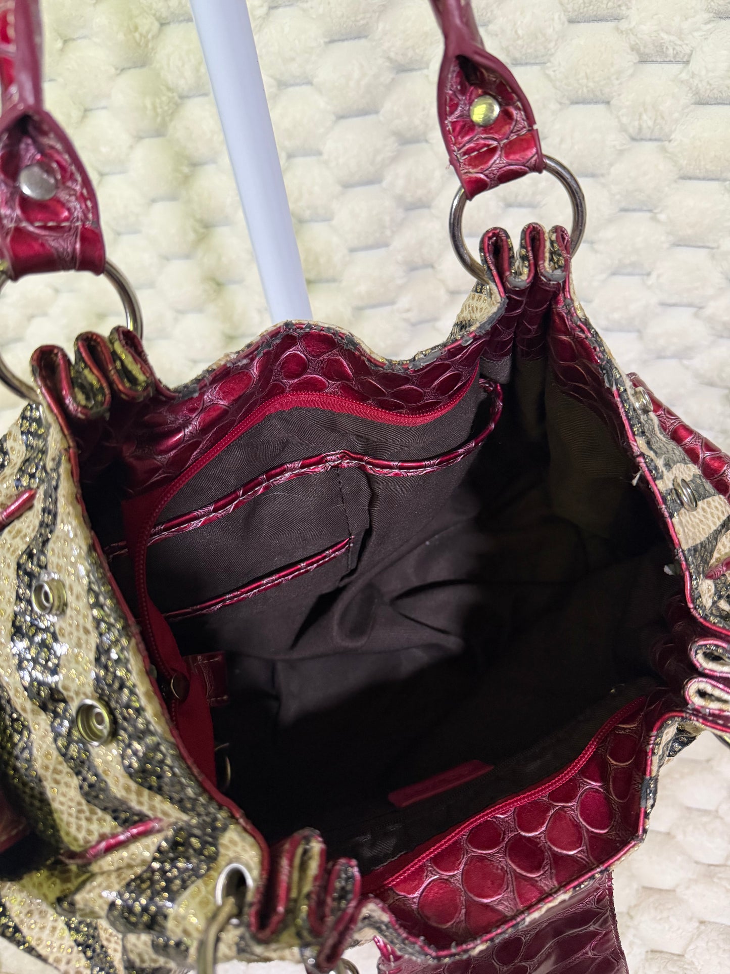 Spacious lined interior with zip pocket and slip pockets