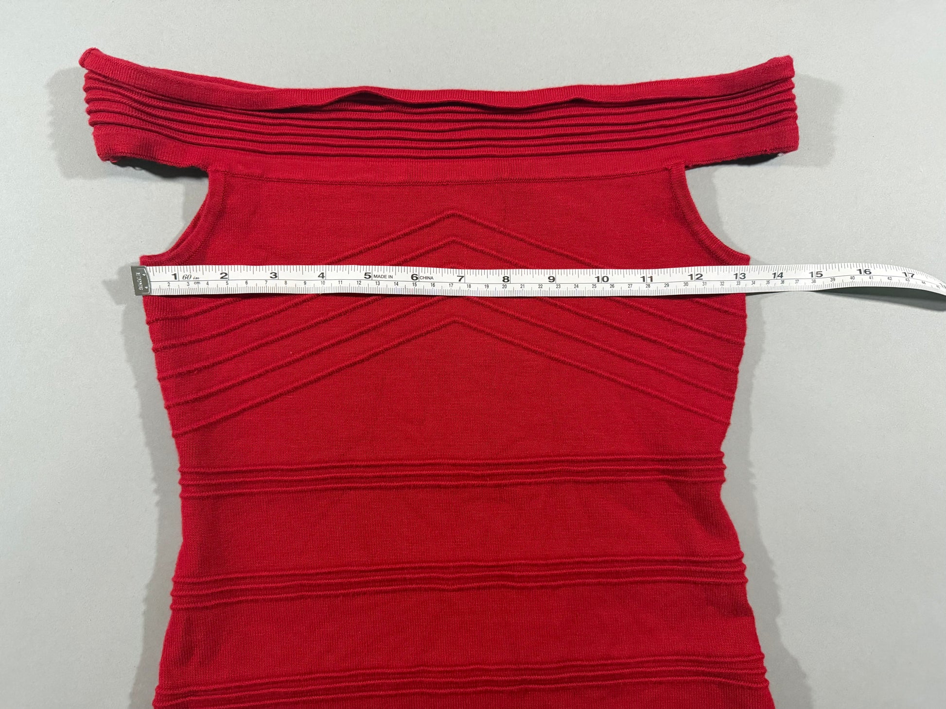 Bust measurement shown across the Forever 21 off-the-shoulder bodycon dress laid flat.