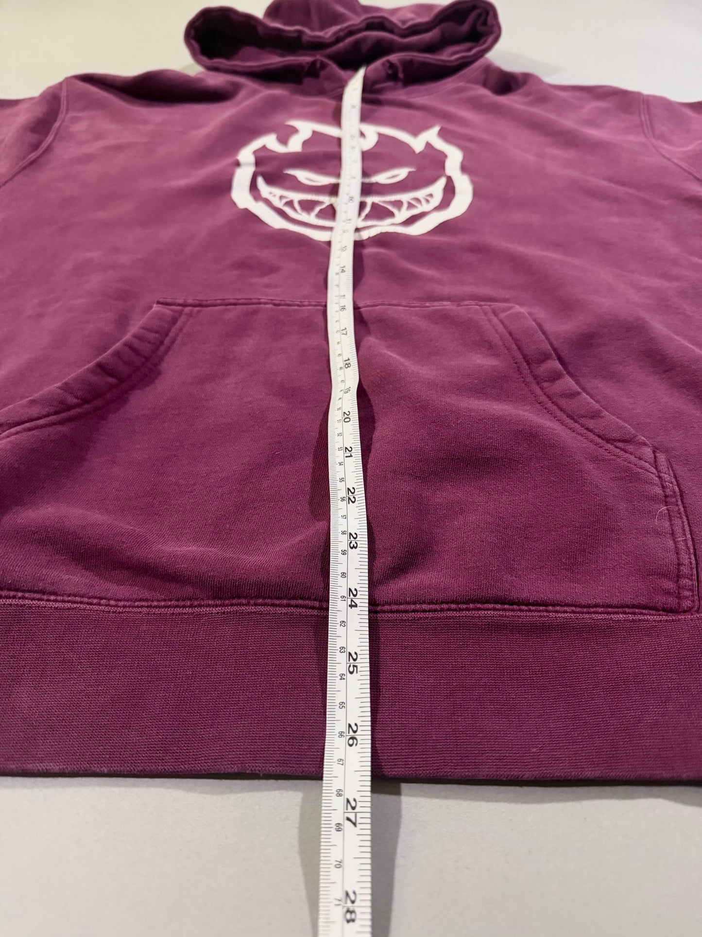 Length measurement shown on plum Spitfire pullover hoodie.