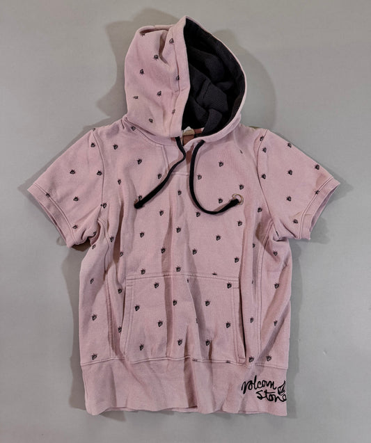 Vintage pink Volcom short sleeve hoodie with all-over berry Stone logo print, kangaroo pocket, and black waffle-lined hood.
