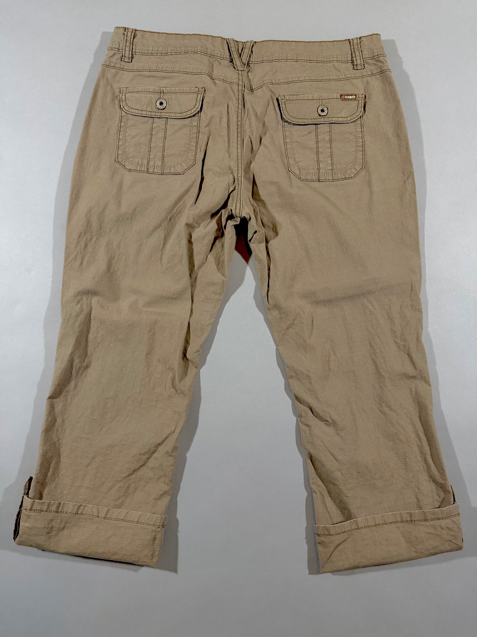 Back view of Angels Jeans khaki capri pants featuring flap back pockets and cuffed hems.
