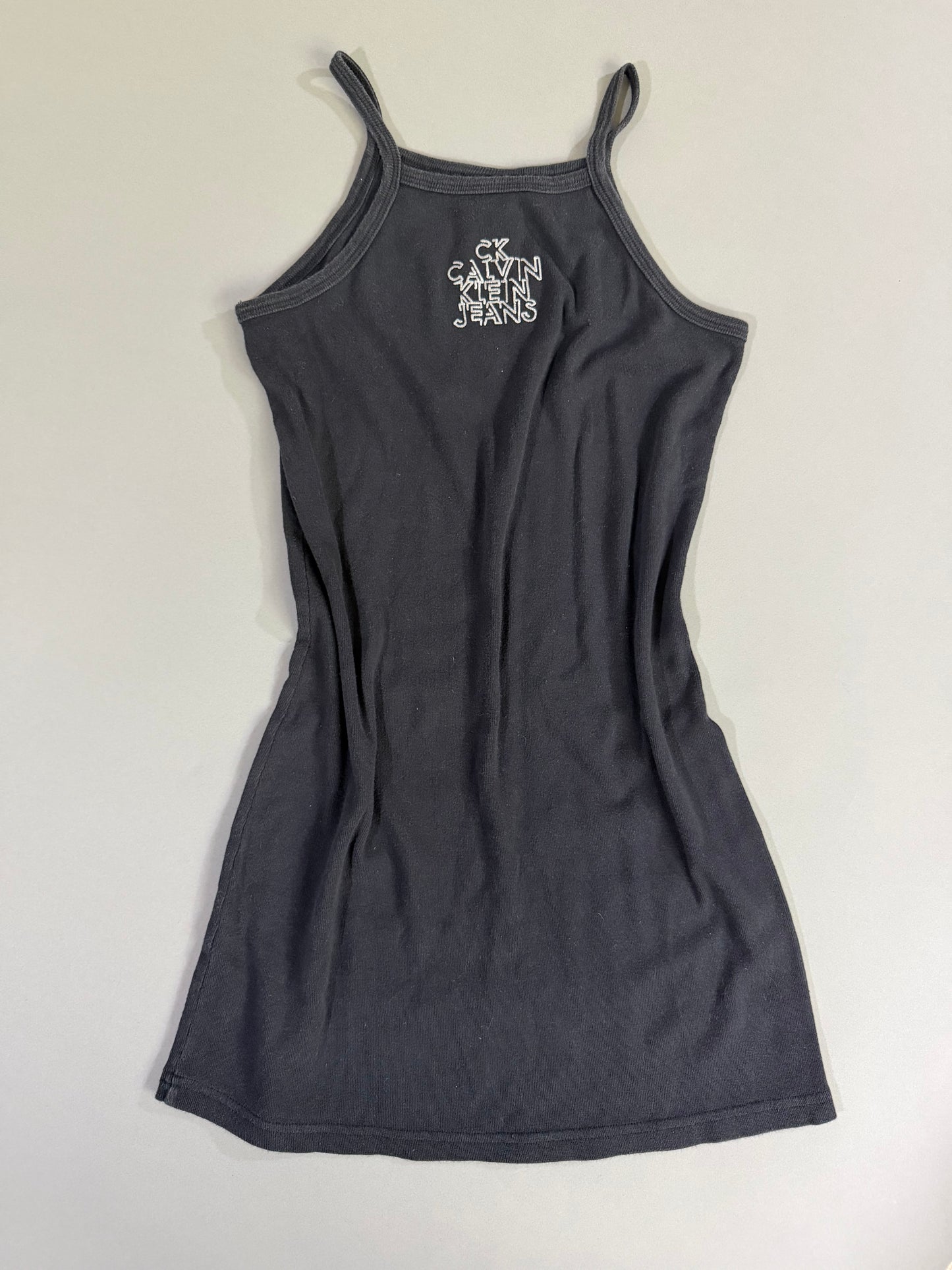 Vintage Calvin Klein Jeans black fitted mini dress with printed stacked CK logo on front.