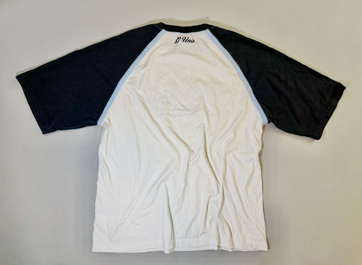 Back view of the G-Unit raglan T-shirt featuring embroidered logo detail below the collar.