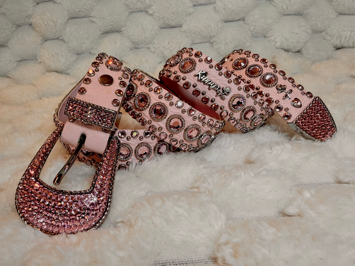 Vintage Kippy’s pink leather Swarovski crystal belt with pink rhinestones, silver hardware and crystal-covered buckle.