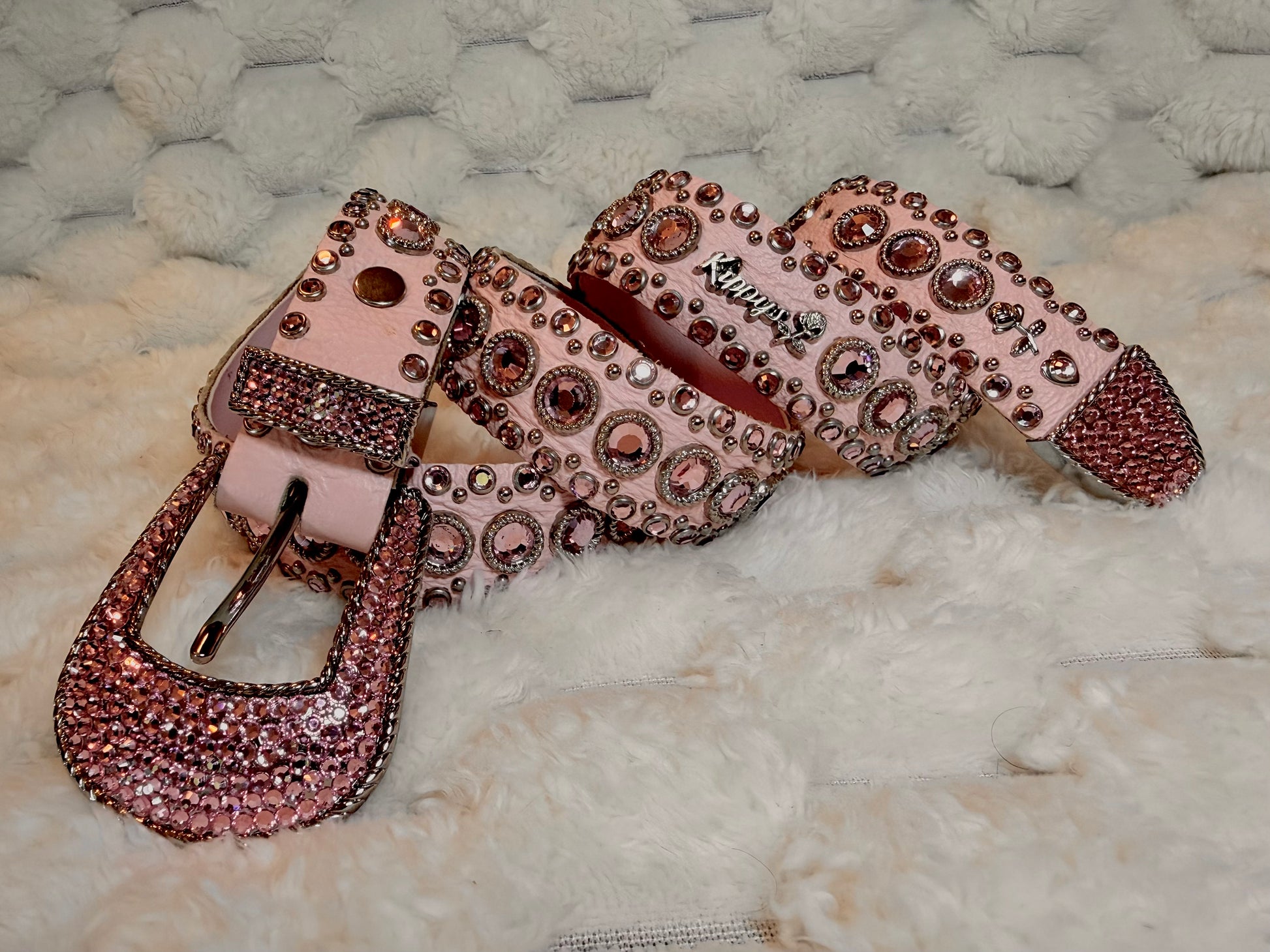 Vintage Kippy’s pink leather Swarovski crystal belt with pink rhinestones, silver hardware and crystal-covered buckle.