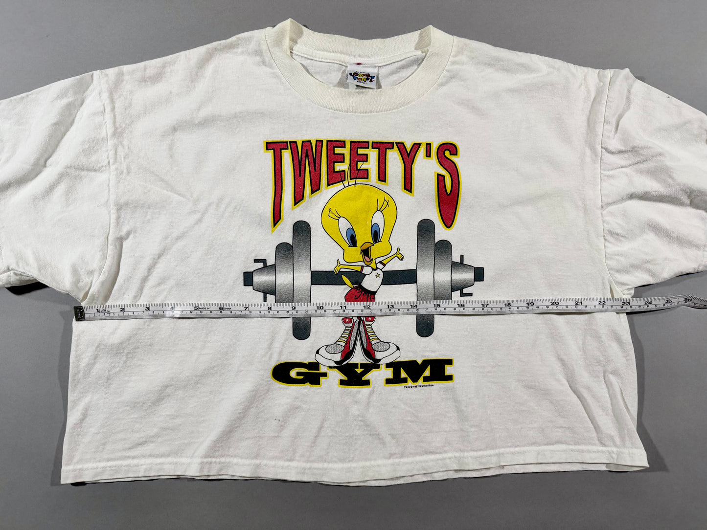 Front view of vintage Tweety graphic tee with chest measurement shown.