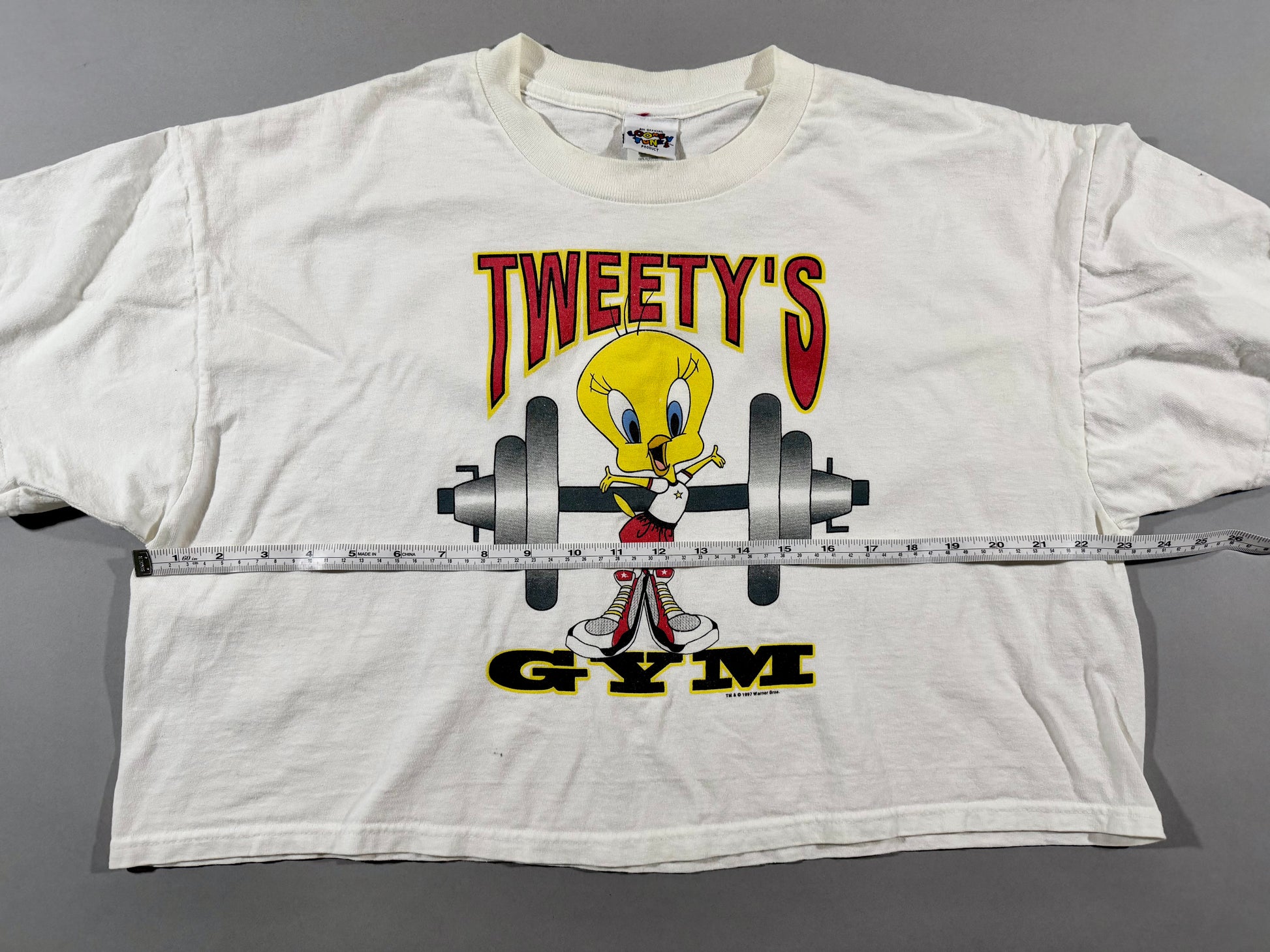 Front view of vintage Tweety graphic tee with chest measurement shown.