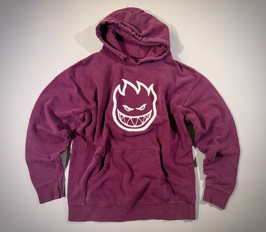 Spitfire Bighead plum purple pullover hoodie with oversized white flame logo laid flat.