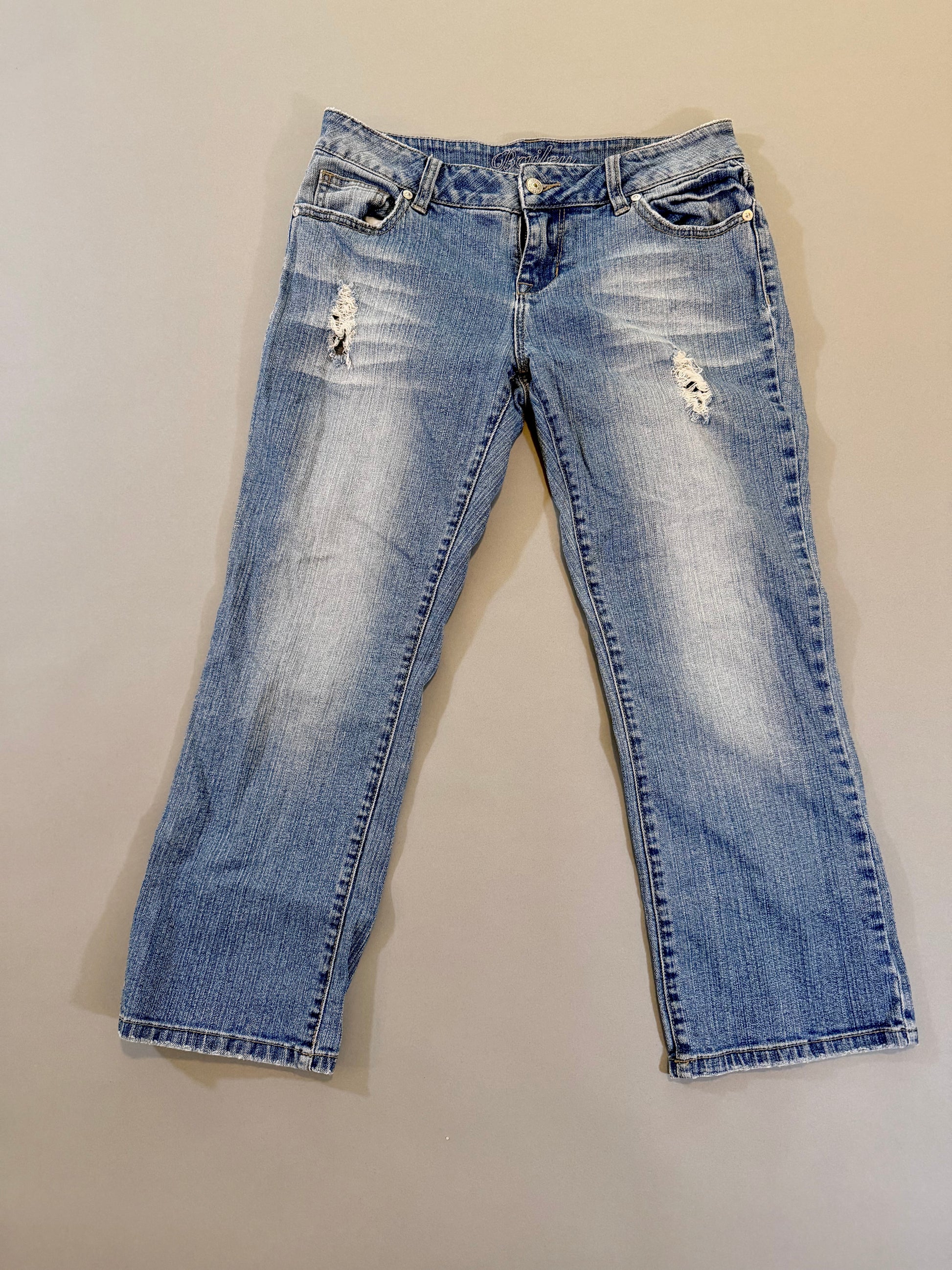 Delia’s bootcut blue jeans with slight distressing 
