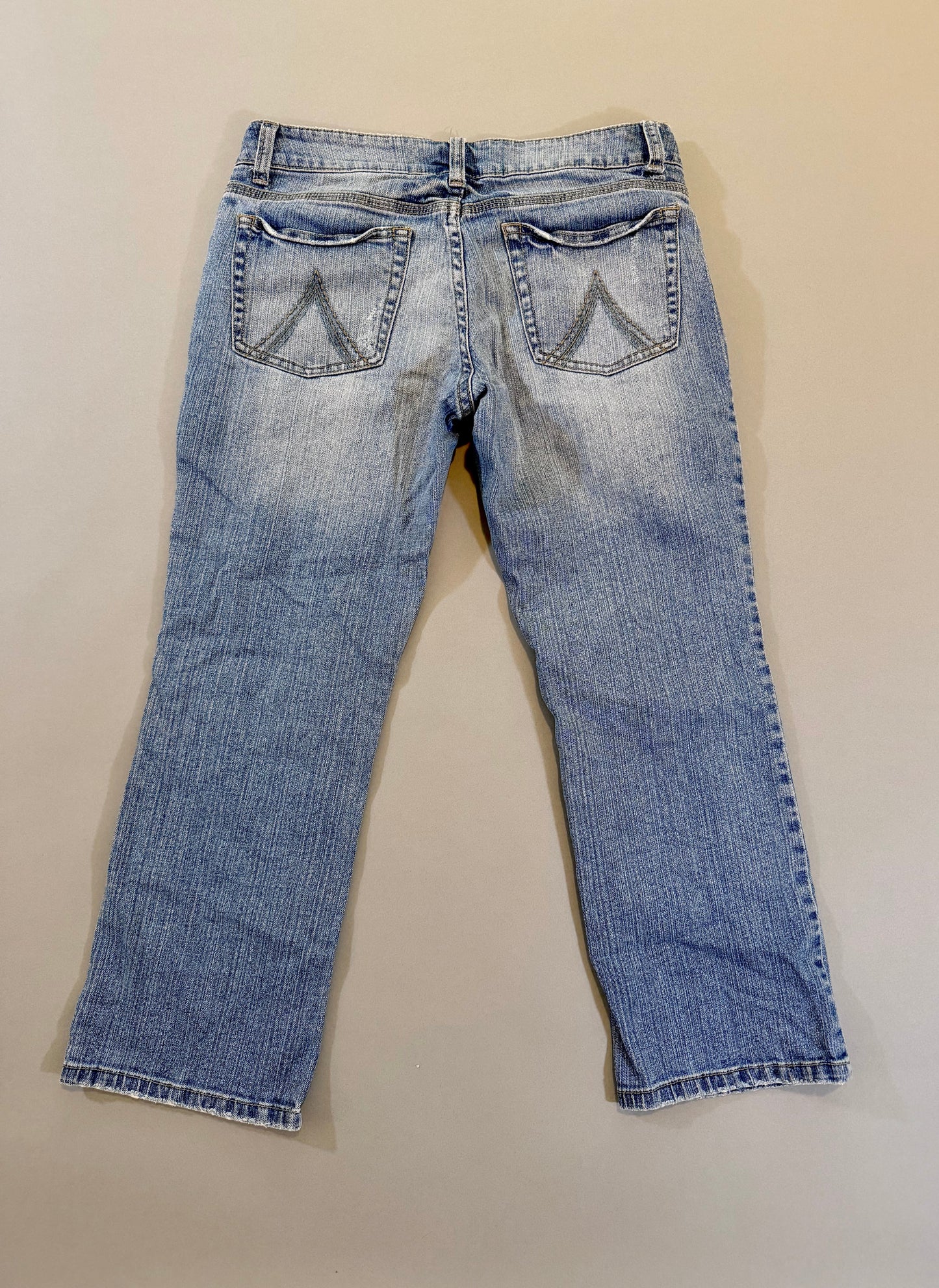 Back of y2k Delia’s bootcut blue jeans 