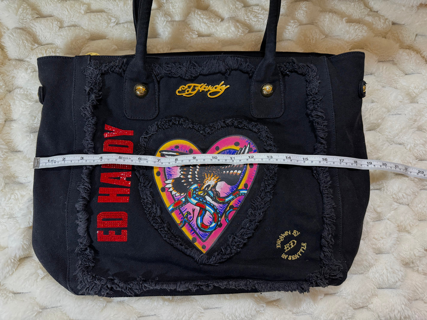 Width measurement of vintage Ed Hardy canvas tote bag laid flat.