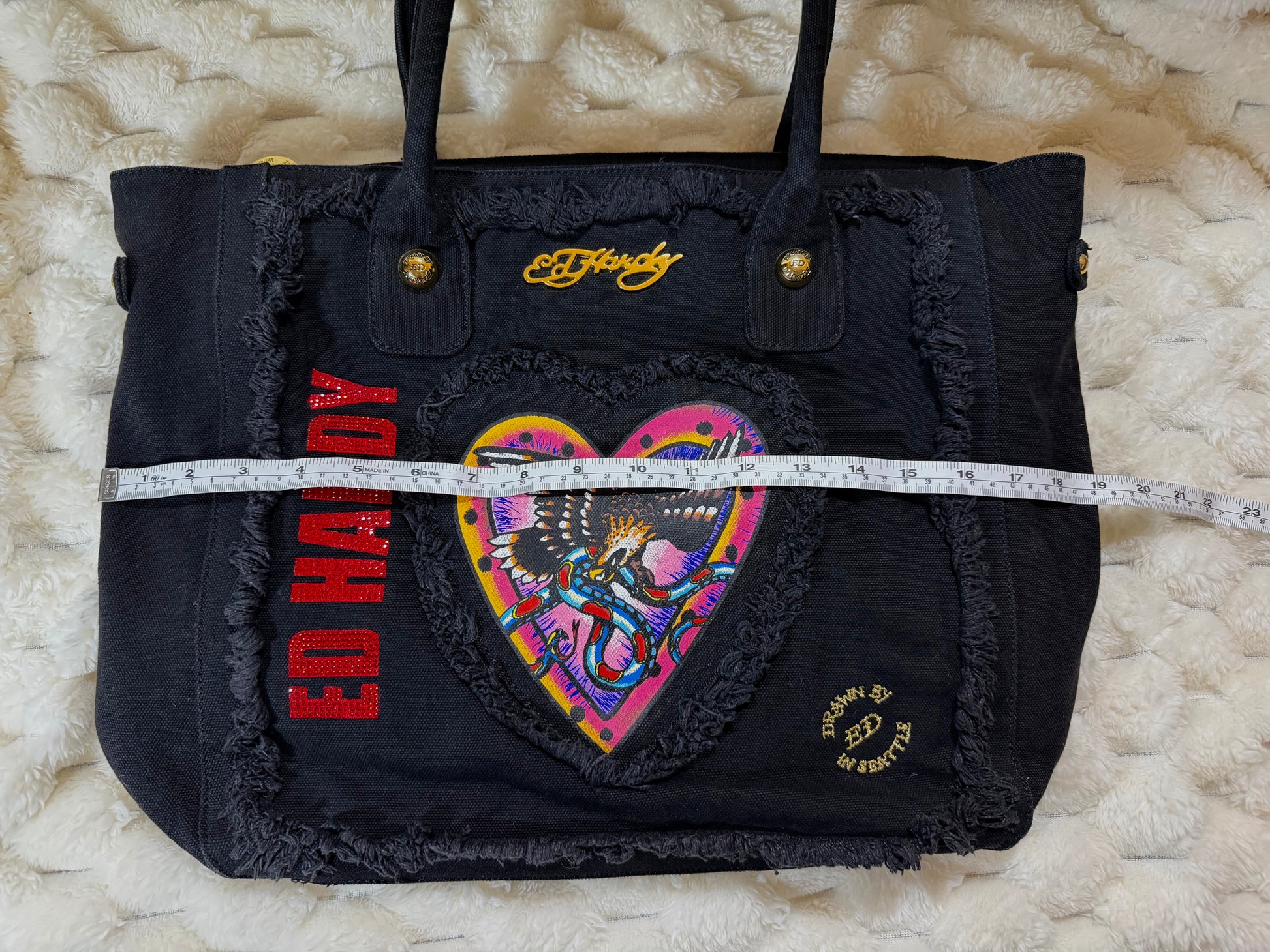 Width measurement of vintage Ed Hardy canvas tote bag laid flat.