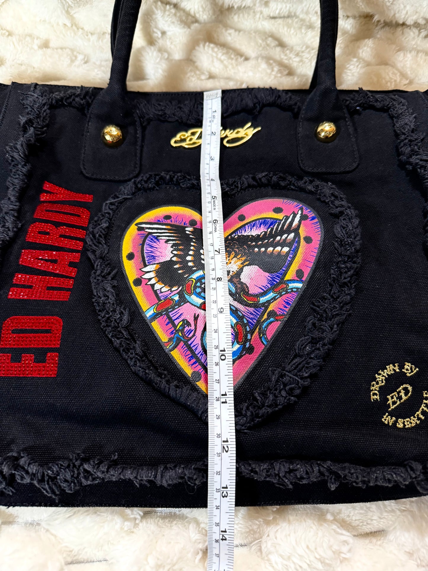 Height measurement of Y2K Ed Hardy Christian Audigier tote bag.
