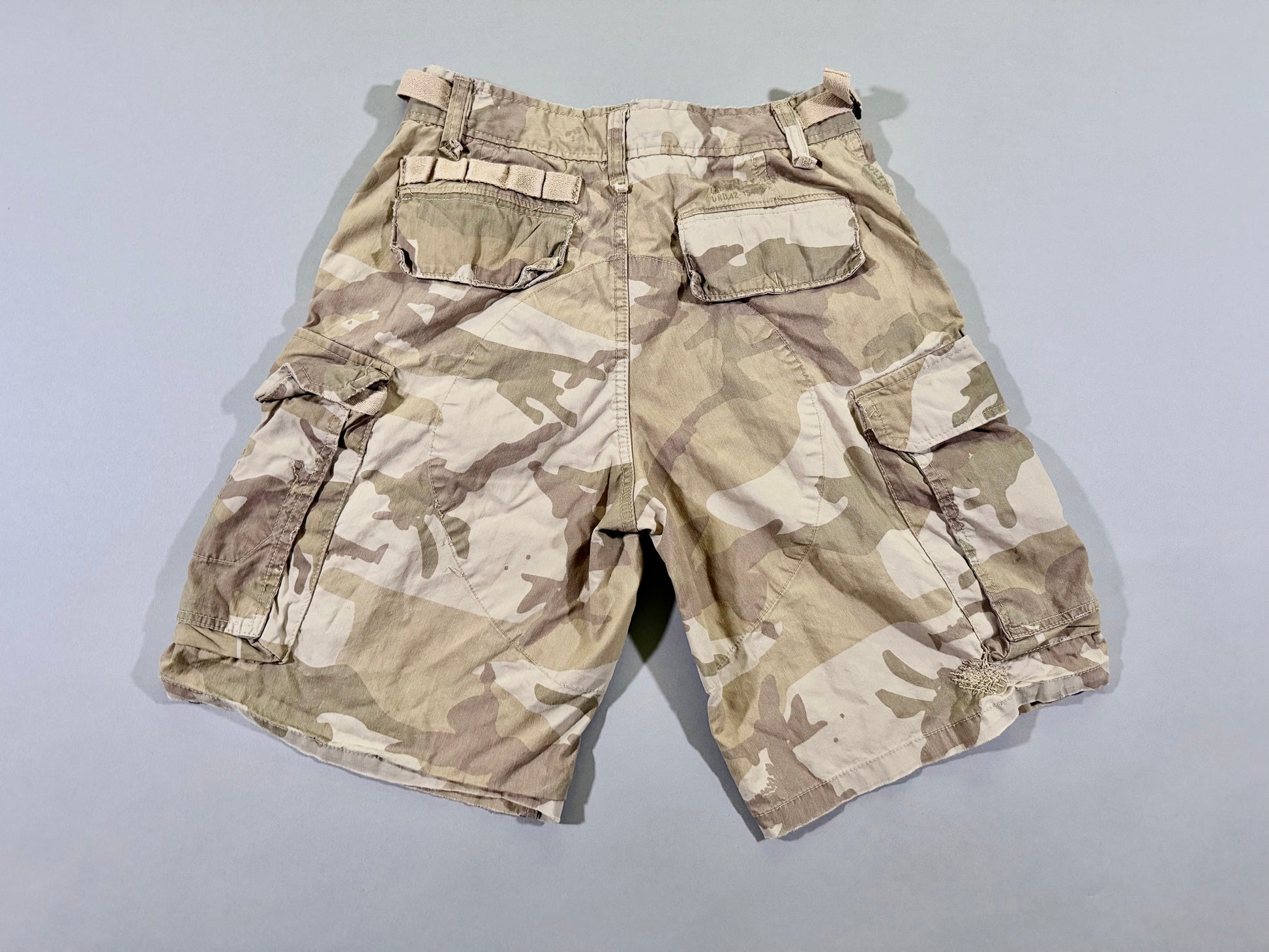 Photo of backside of camo utility shorts 